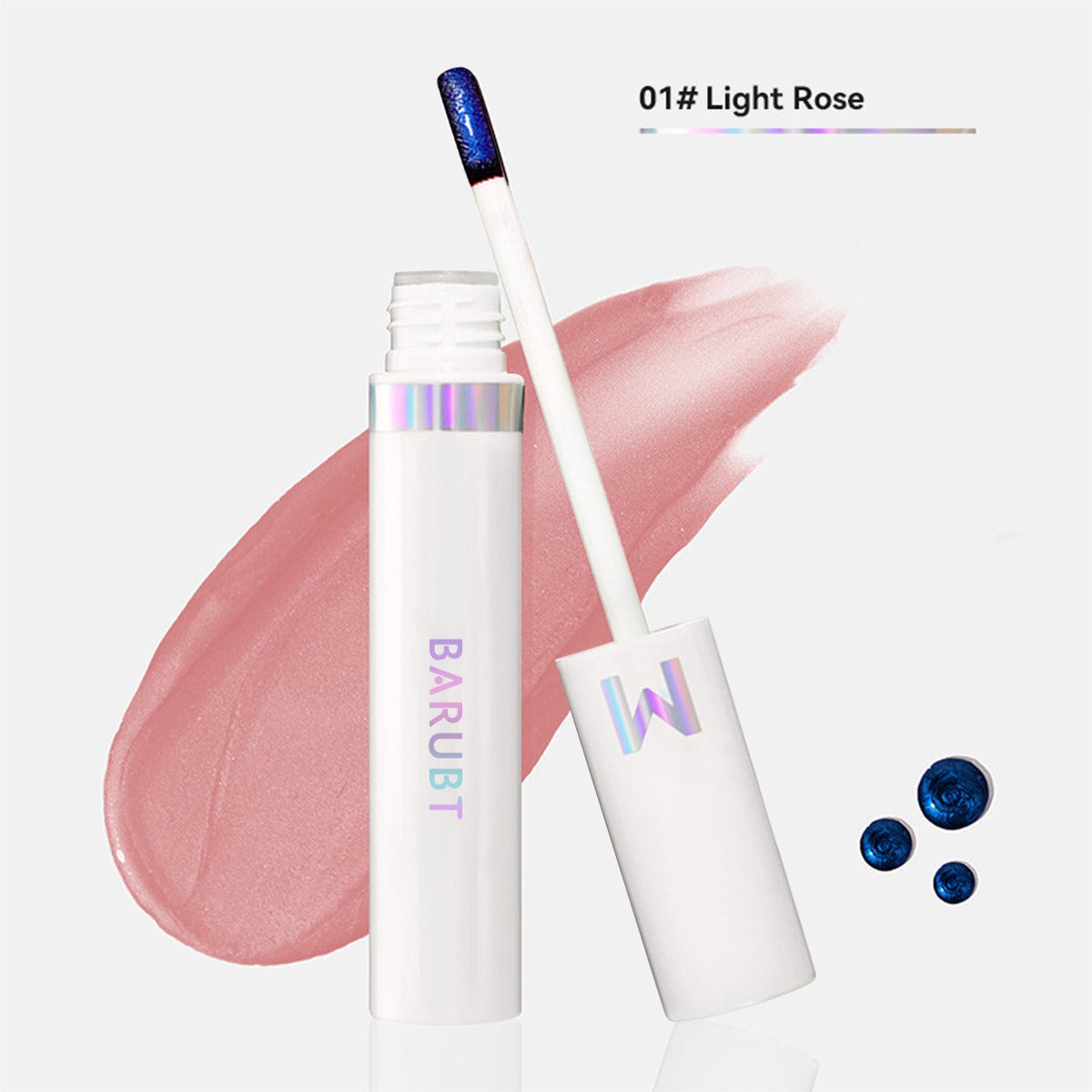 Lip gloss with applicator and 'BARUBT' branding on a light pink background