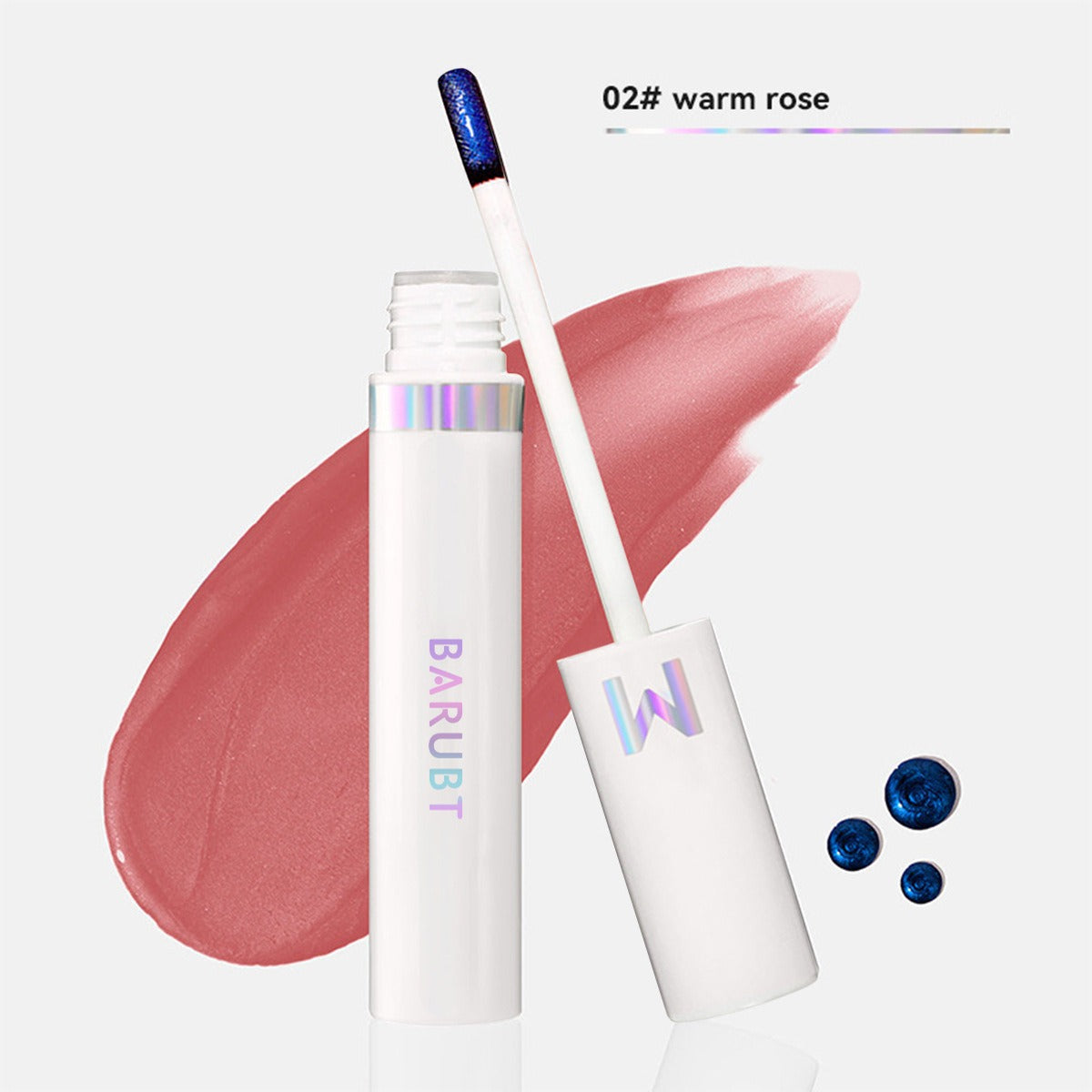 Lip gloss with applicator and 'BARUBT' branding on a light pink background